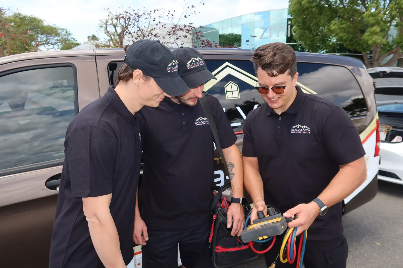 Solvanta Home Services technicians reviewing diagnostic readings