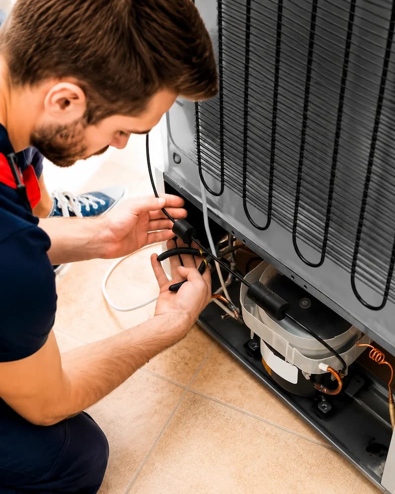 Solvanta technician diagnosing a freezer sealed system and compressor